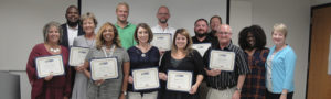 GrowSMART participants posing with their completion certificates