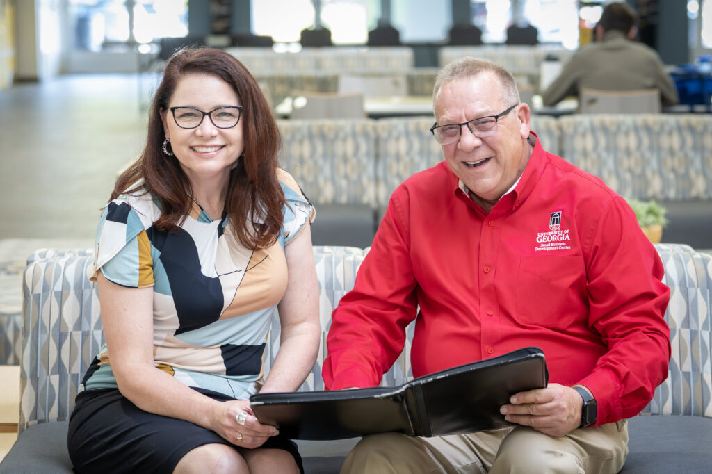 Business Consultant Drew Tonsmeire with UGA SBDC Client